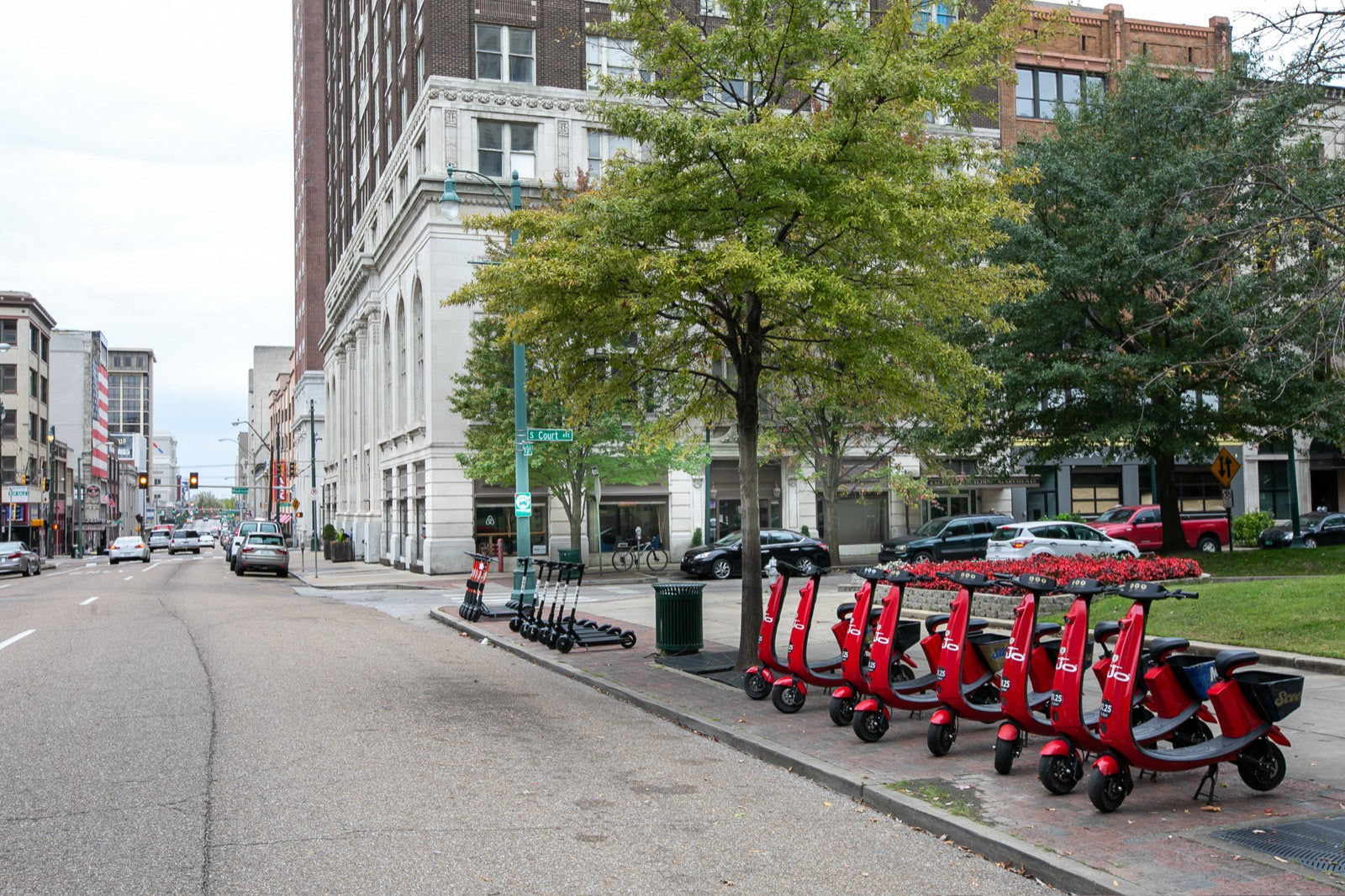 Walkable Court Avenue streetscape with shared e-scooters outside the Exchange Building, Memphis