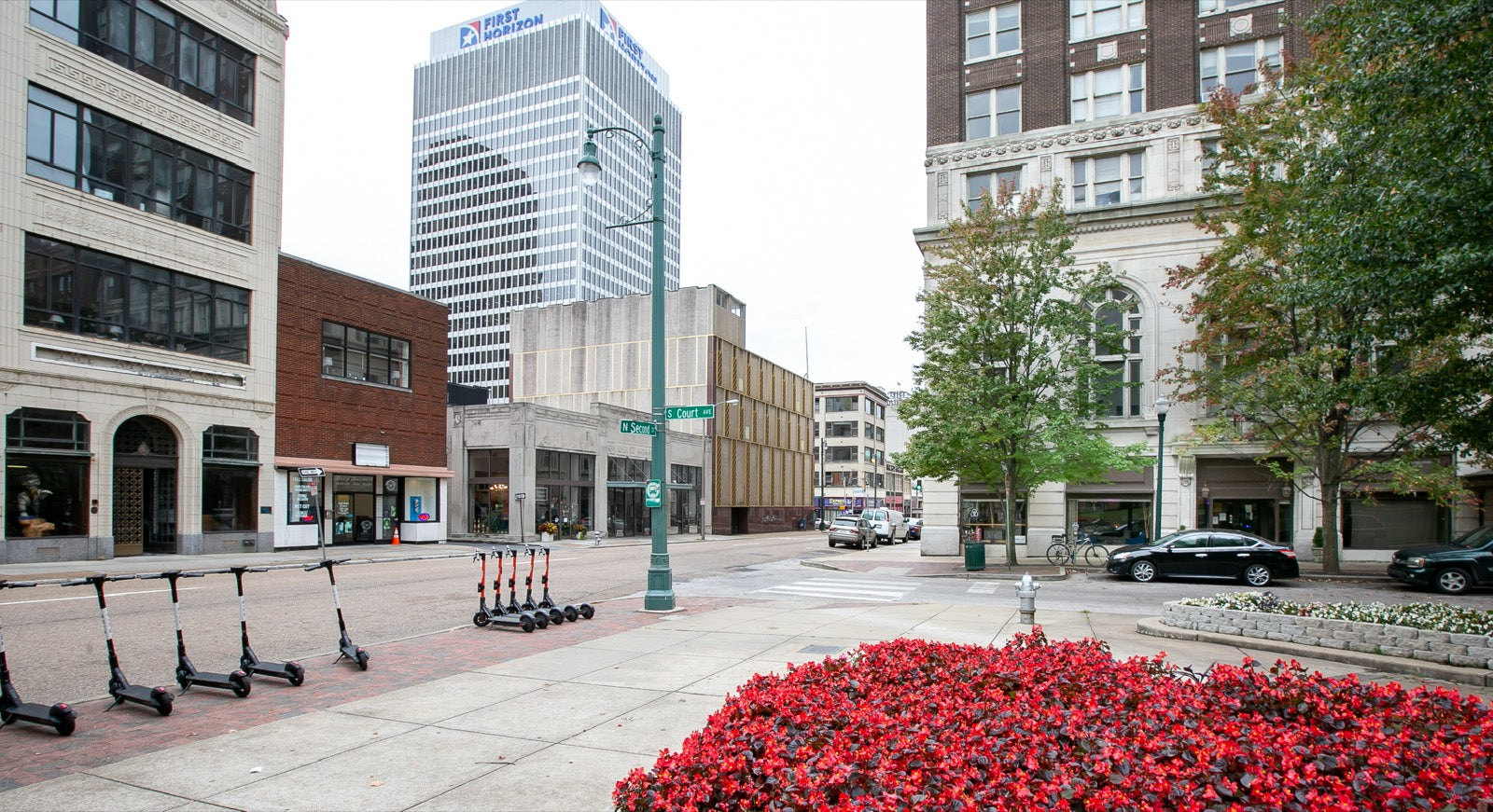 Downtown Memphis street corner with seasonal flower beds near the Exchange Building