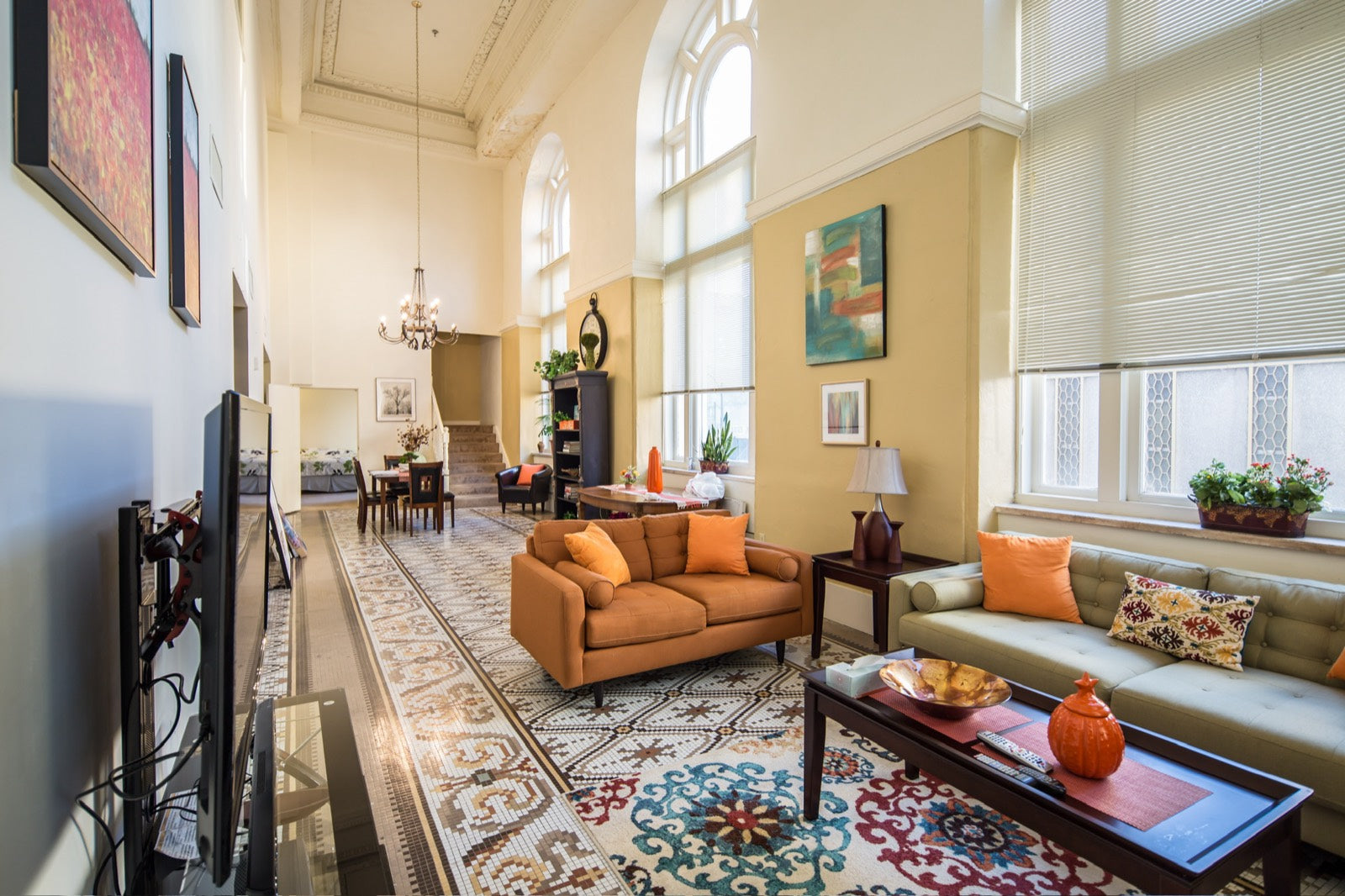 Grand furnished parlor with arched windows and restored mosaic floor, Exchange Building Memphis