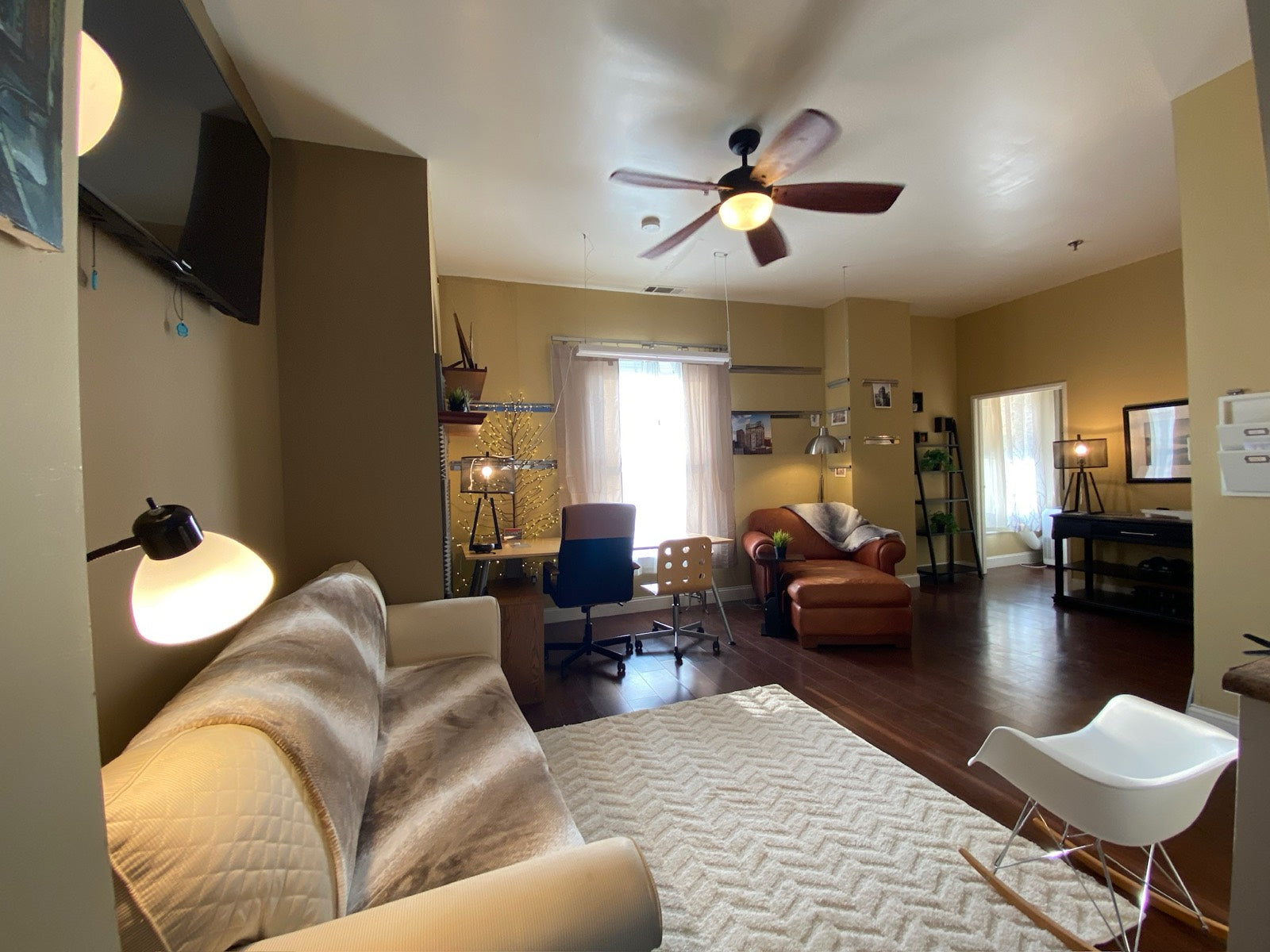 Furnished studio loft with lounge seating and workspace, Exchange Building Memphis