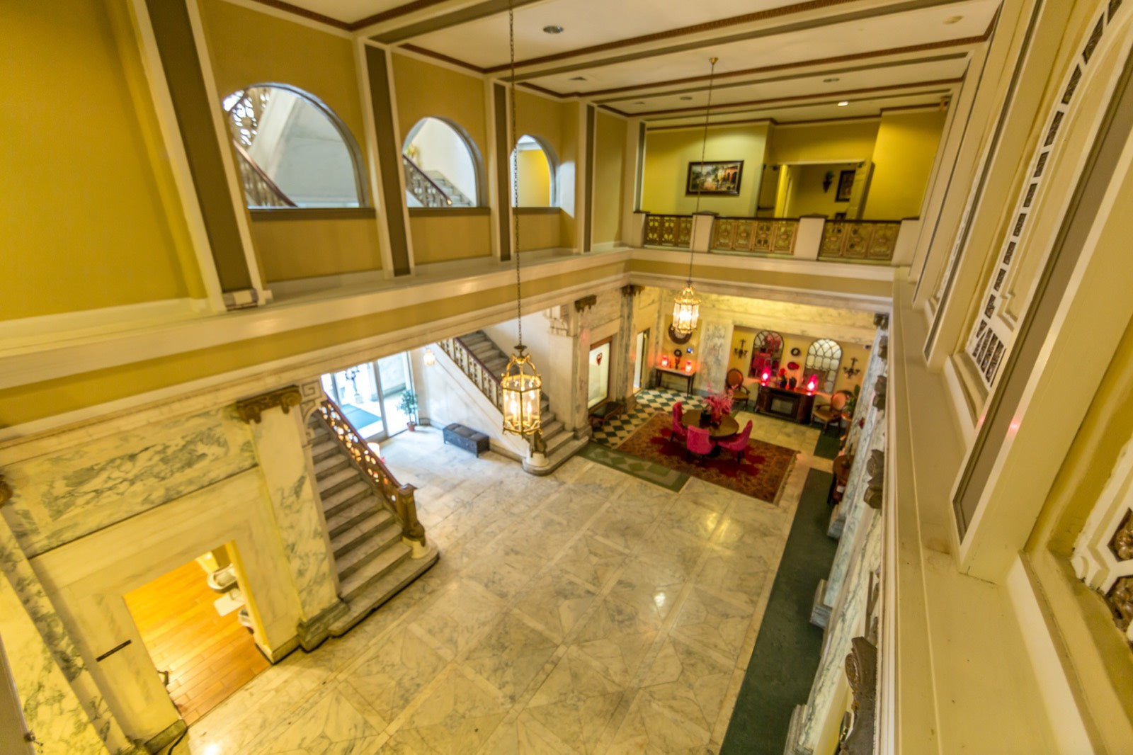 Two-story marble grand lobby inside the historic Exchange Building